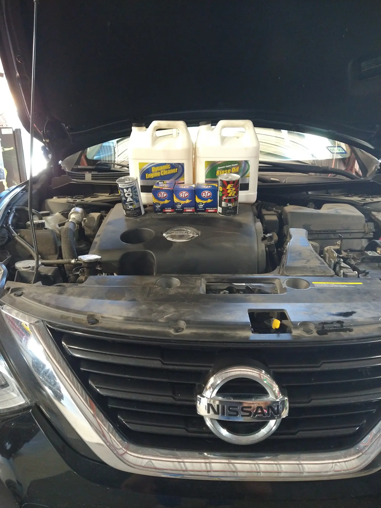 Engine bay of a car in for diagnostics