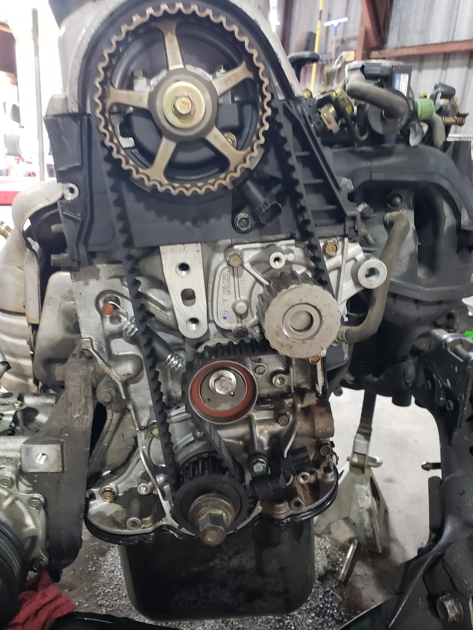 An engine with the timing cover off during repair